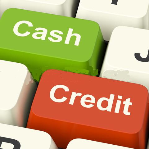 Cash And Credit Keys Showing Consumer Purchases Using Money Or Debts